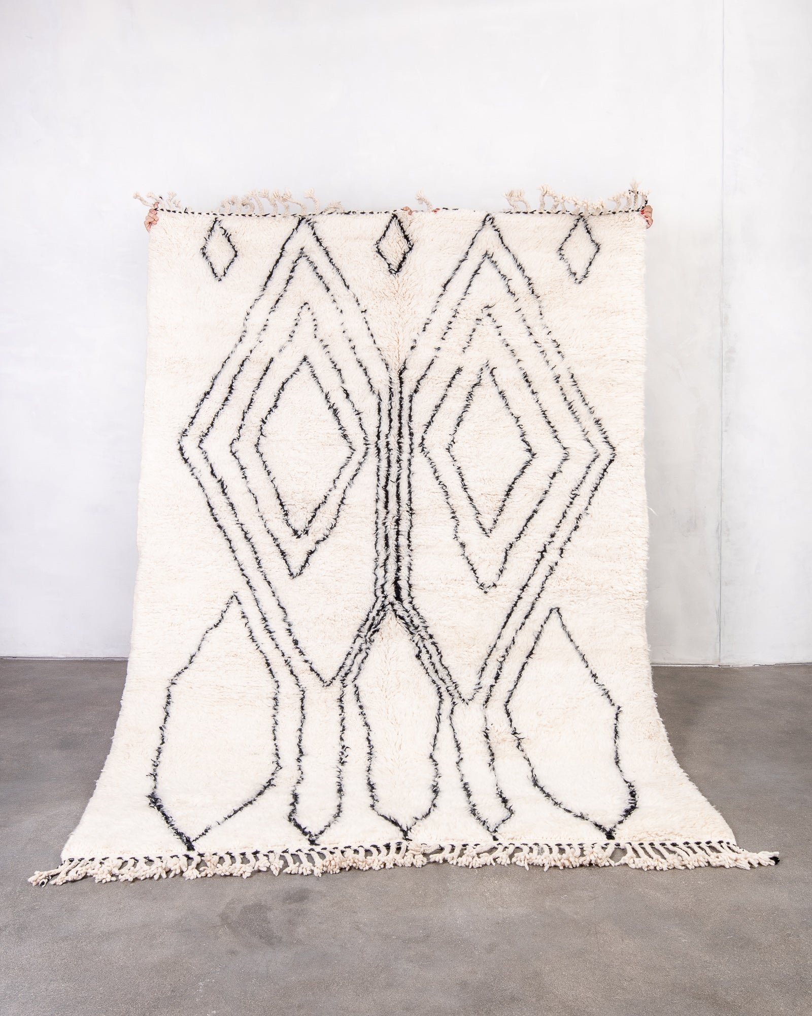 Modern, designer, handcrafted Berber rug from Morocco. Beniourain carpet with beautiful colours and patterns and fluffy wool texture.